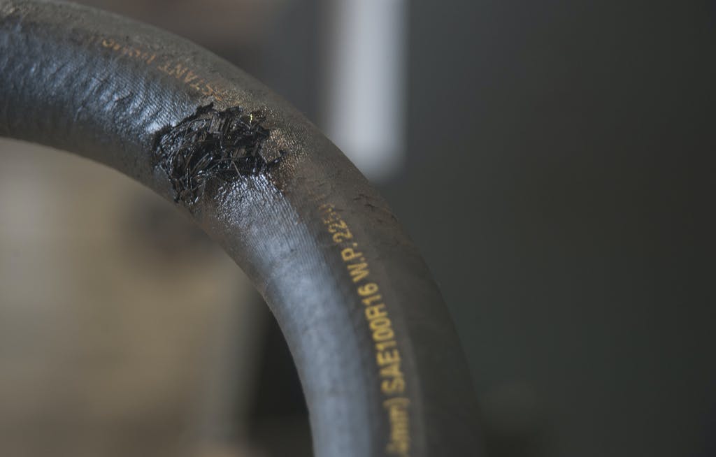 inspecting hydraulic hoses